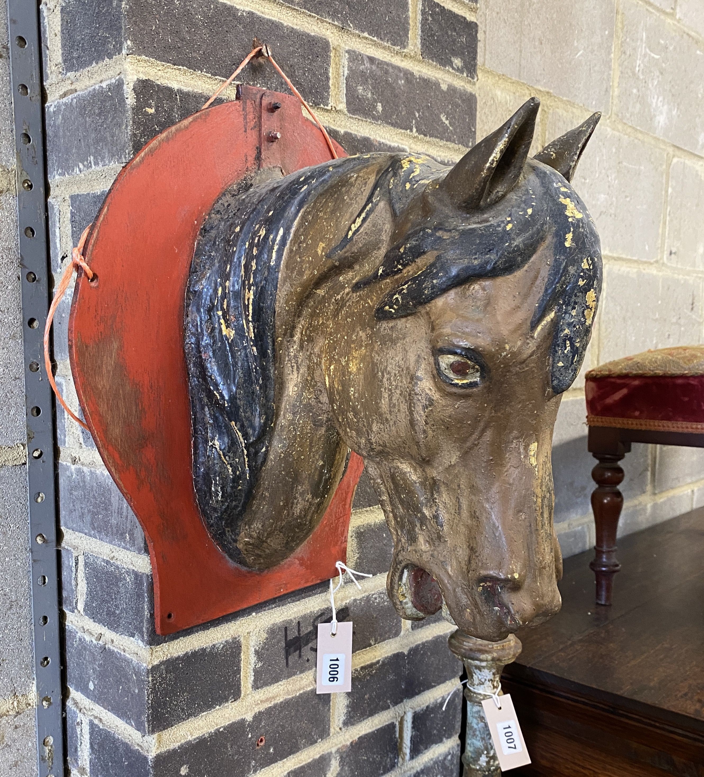 A vintage painted zinc horse head wall applique, height 43cm